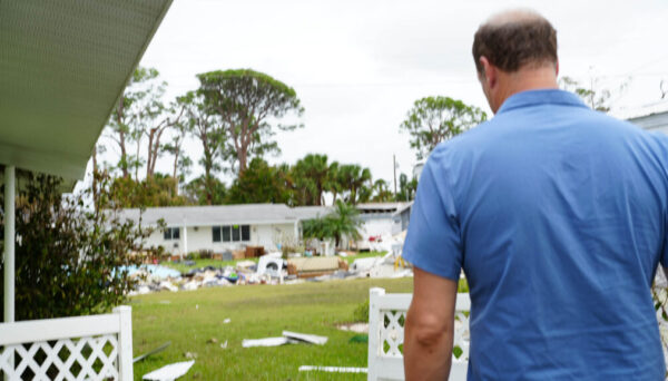 Florida Public Adjuster inspecting flood damage after hurricane