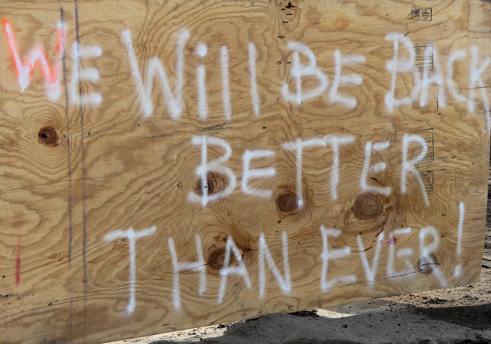 Sign after a hurricane: We Will Bew Back Better Than Ever!