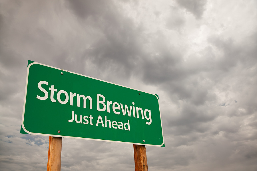 Storm Brewing Green Road Sign.